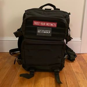 Wolfpak 25L black backpack in excellent used condition